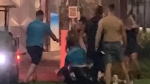 The large brawl was filmed by a group of people at a nearby McDonalds