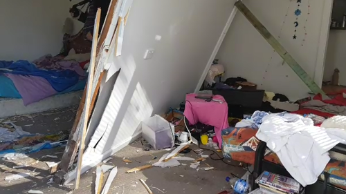 The full force of the car left significant damage to the weatherboard home. (9NEWS)