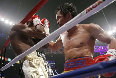 Mayweather was forced up against the ropes on several occasions.