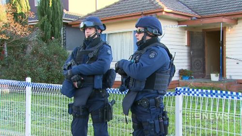 The men were arrested in separate dawn raids this morning. (9NEWS)