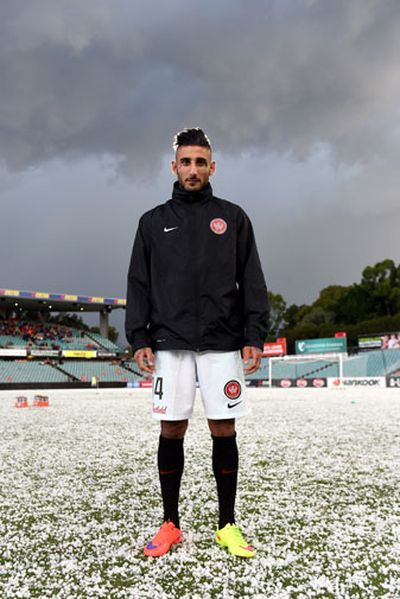 Wanderers striker Kerem Bulut has his picture taken on the strange landscape. (AAP)