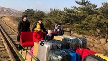 Unable to get out of North Korea any other way, this Russian family resorted to a hand-powered railway trolley.