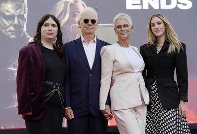 Actor Jamie Lee Curtis, second from right, poses with her husband Christopher Guest, second from left, and their daughters Ruby, far left, and Annie during a hand and footprint ceremony for Curtis at TCL Chinese Theatre, Wednesday, Oct. 12, 2022, in Los Angeles. (AP Photo/Chris Pizzello)