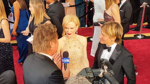 Best Supporting Actress and Lion star Nicole Kidman with husband Keith Urban. (9NEWS/Ehsan Knopf)