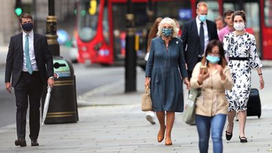 Camilla, Duchess of Cornwall wears a mask with a feather design on July 28, 2020 in London, England
