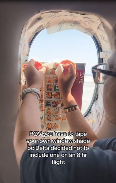 US Traveller says she was made to tape her own window shade on flight. 