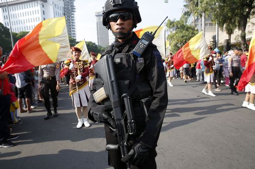 Authorities were also seen on streets in Jakarta following the blasts. Picture: AAP.