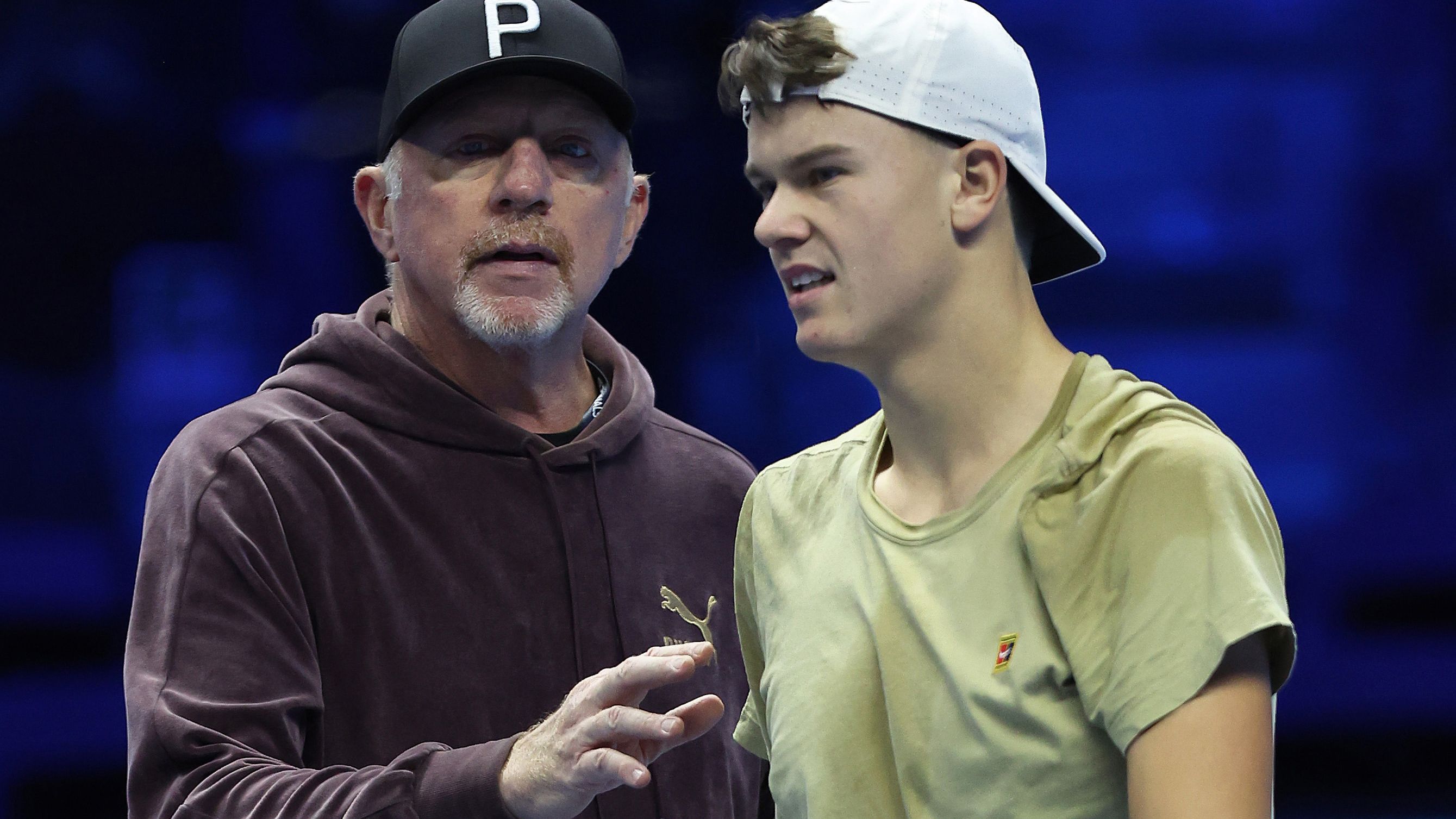 Coach Boris Becker with Holger Rune of Denmark during a practice session prior to the ATP Finals at Pala Alpitour in Turin.