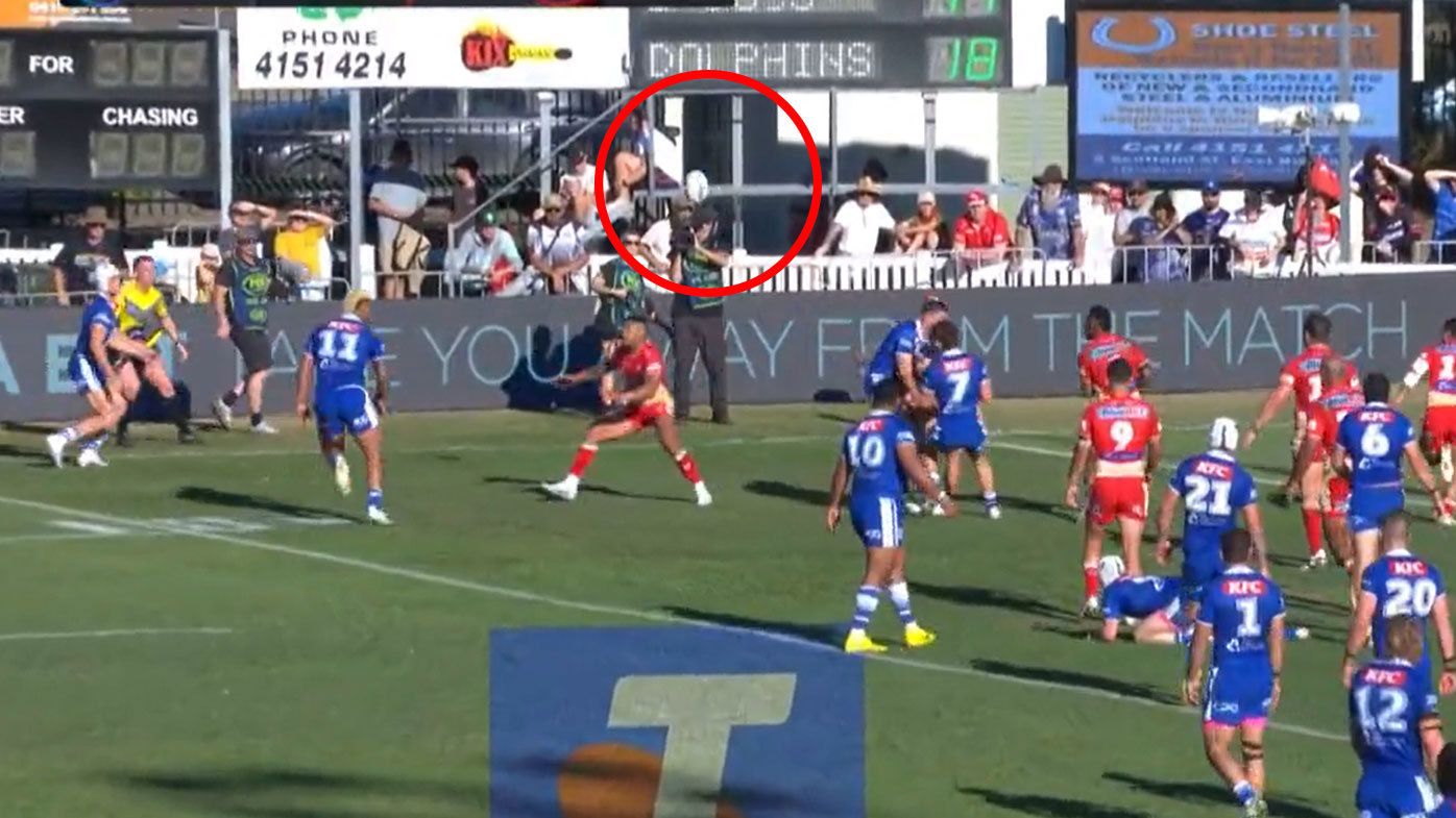 Referees ruled this pass from Toby Sexton to Blake Wilson to be legal as the Bulldogs took the lead over the Dolphins