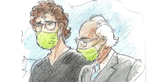 In this courtroom sketch, Patrick Crusius, left, appears with his attorney, Joe Spencer,  in federal court.