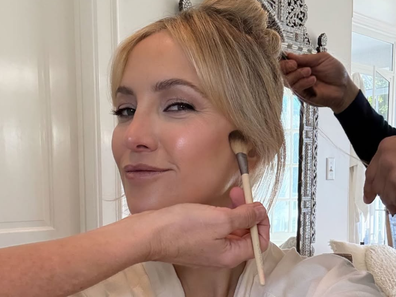 Kate Hudson prepares for the 2025 Golden Globes.