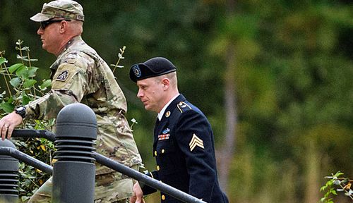 US Army soldier Bowe Bergdahl, (right) arrives at his court martial. (Photo: AP).