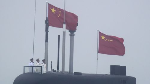 China's navy and air force took part in military drills close to Taiwan in a provocative act.