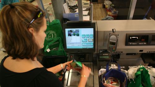 Many supermarkets have integrated self checkouts along with cashiers. 