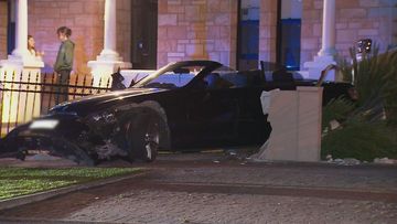 A BMW crashed through the front fence of a home in Adelaide. Road rage Esplanade Adelaide