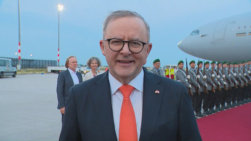 Anthony Albanese spoke to reporters after he touched down in Berlin, Germany. 