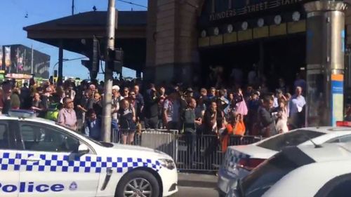 Flinders Street Station has remained open but police are urging motorists to avoid the area. (9NEWS)
