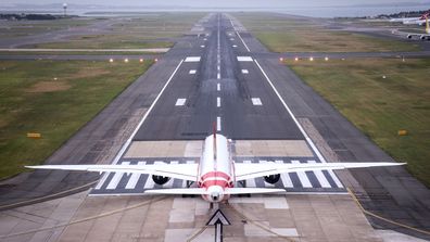 A Boeing 787 Dreamliner aircraft, Qantas flight QF100, prepares to take off from Kingsford Smith International airport.