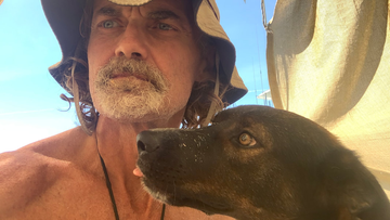 Tim Shaddock and his dog have been rescued in the Pacific Ocean after surviving by drinking rain water and eating raw fish for months.