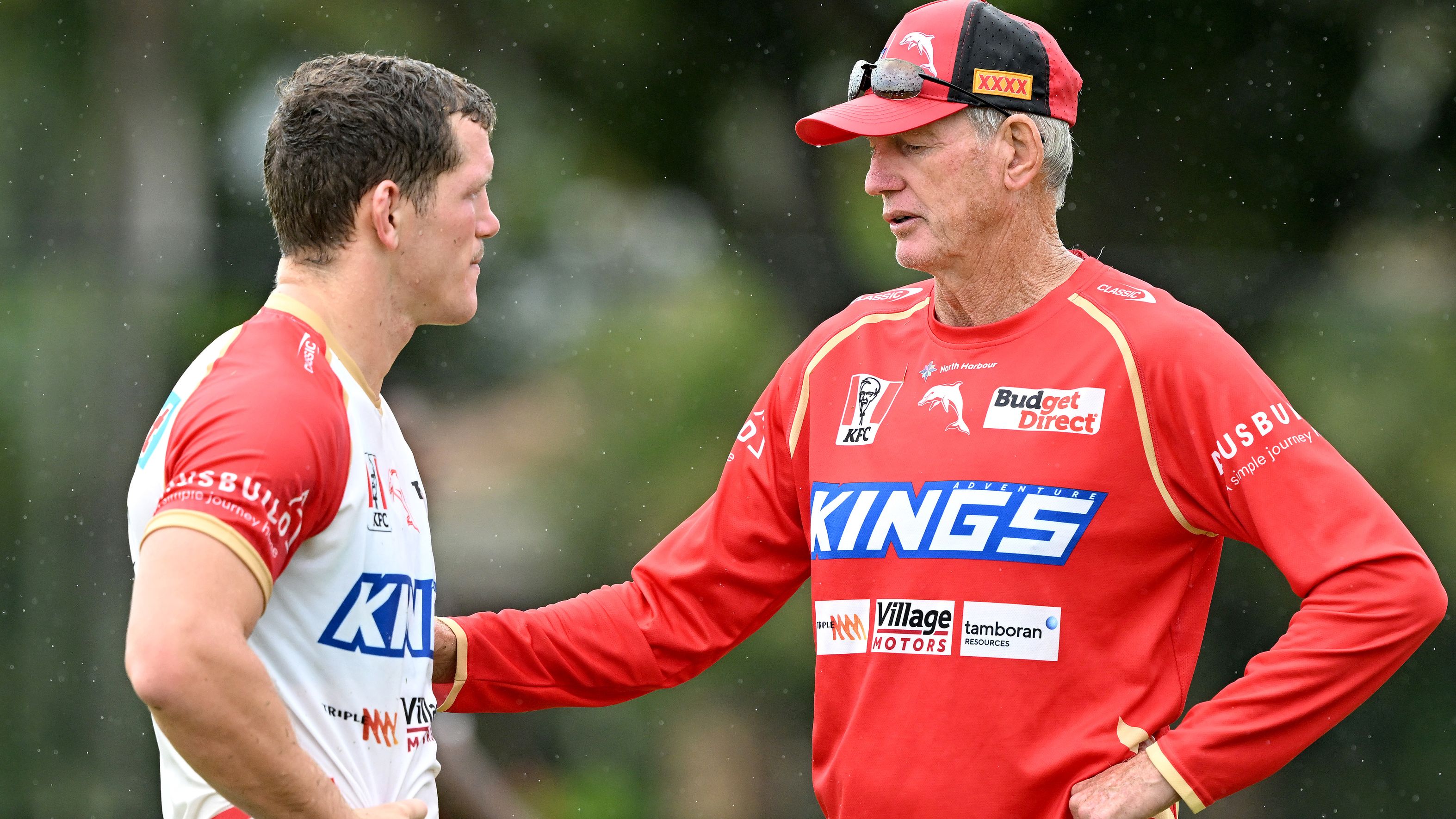 Coach Wayne Bennett chats with Tom Gilbert during a Dolphins NRL training session at Kayo Stadium on January 24, 2023 in Brisbane, Australia. (Photo by Bradley Kanaris/Getty Images)