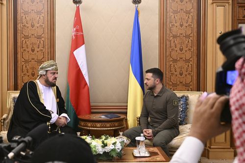 Ukraine's President Volodymyr Zelenskyy, right, meets with Asaad bin Tariq bin Taimur Al Said, Deputy Prime Minister of Oman Sultanate during the Arab summit in Jeddah, Saudi Arabia, Friday, May 19, 2023. 