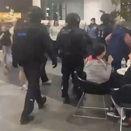 Seven boys were arrested following an alleged violent stabbing which unfolded in front of shocked shoppers at a Melbourne's Westfield Doncaster on Friday.