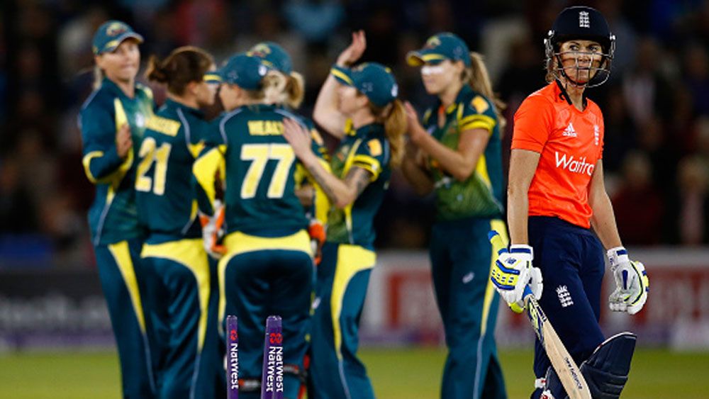 Australian players celebrate the wicket England captain Charlotte Edwards. (Getty)