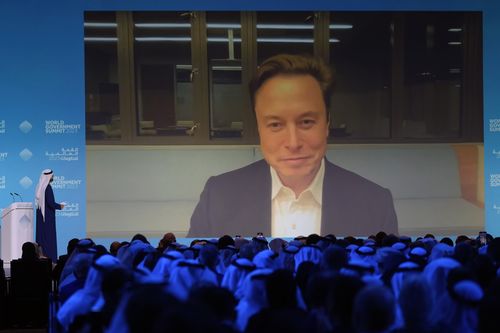 Elon Musk talks virtually to UAE Minister of Cabinet Affairs Mohammad Al Gergawi during the World Government Summit in Dubai, United Arab Emirates, Wednesday, Feb. 15, 2023. 