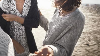 Women talking outdoors