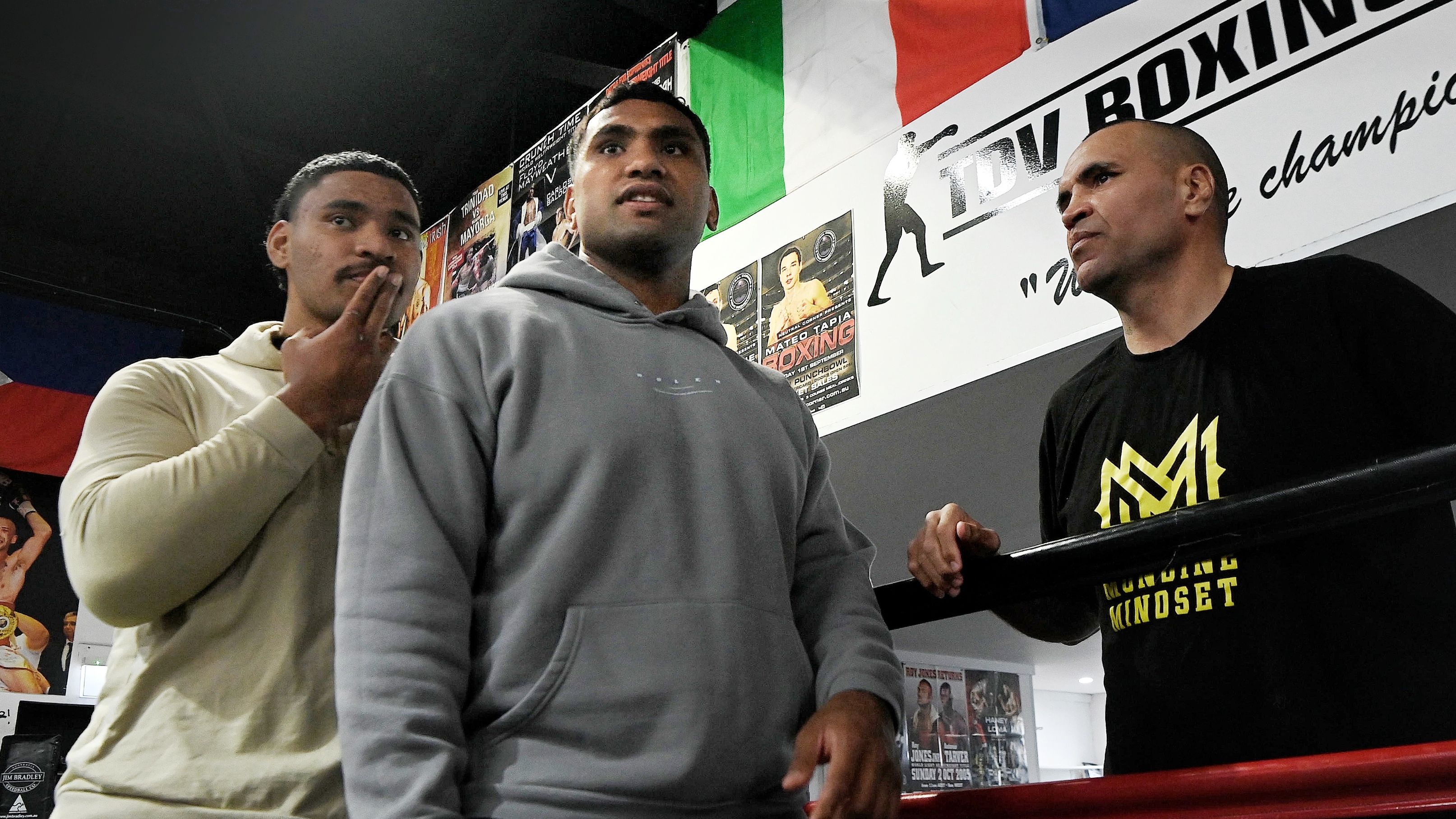 Tevita Pangai (centre) with his brother Jermaine Pangai  (left) and Anthony Mundine (right) at the Bondi Boxing Club.