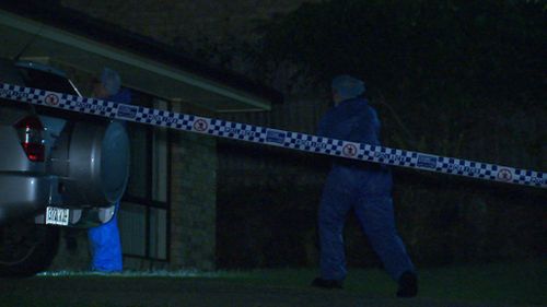 Forensic investigators remain at the home. (9NEWS)