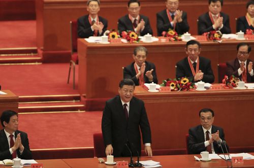 China's President Xi Jinping finishes his speech during a ceremony to mark the 40th anniversary of China's "reform and opening up" at the Great Hall of the People in Beijing.