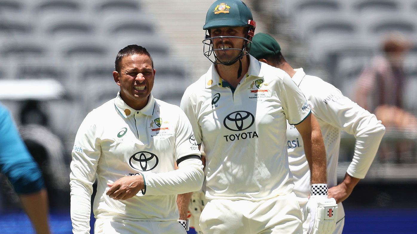 Usman Khawaja was one of several batters to cop a ball to the body during the Perth Test on a controversial pitch
