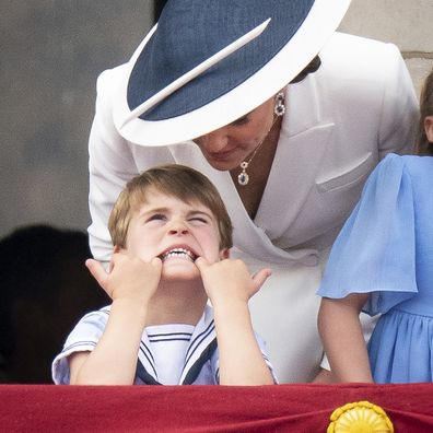 Kate, Duchess of Cambridge and Prince Louis watch from the balcony of Buckingham Place after the Trooping the Color ceremony in London, Thursday, June 2, 2022, on the first of four days of celebrations to mark the Platinum Jubilee. The events over a long holiday weekend in the U.K. are meant to celebrate the monarch's 70 years of service.