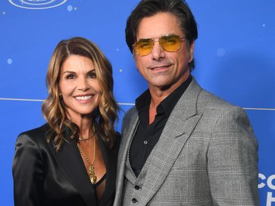 LOS ANGELES, CALIFORNIA - OCTOBER 29: Lori Loughlin and John Stamos attend Cool Comedy Hot Cuisine Benefitting The Scleroderma Research Foundation at Fairmont Century Plaza on October 29, 2024 in Los Angeles, California. (Photo by Alberto E. Rodriguez/Getty Images)