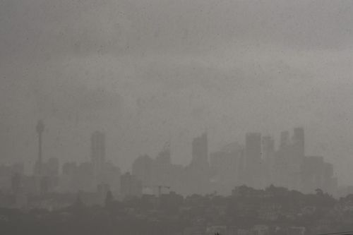 SMH News Sydney. Sydney Weather. Photo shows, Rain rolls across the Sydney basin. Photo Peter Rae. Tuesday 5 Oc