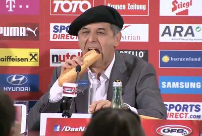 <b>Austrian football coach Marcel Koller turned a post-match conference into a culinary experience when he broke bread with a number of journalists.</b><br/><br/>The 54-year-old fronted the press after guiding the country to Euro 2016 in France following a 4-1 victory over Sweden.<br/><br/>Wearing a beret and sitting behind a baguette, Koller made a short statement before breaking the loaf and enjoyed a tasty bite. <br/><br/>See how the hungry coach ranks among our gallery of bizarre sport interviews.