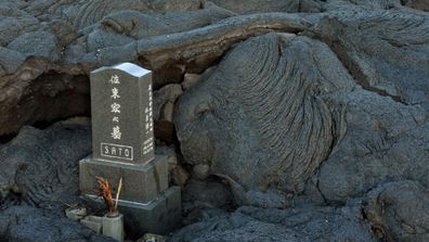 Lava spares family headstone in cemetery (Gallery)