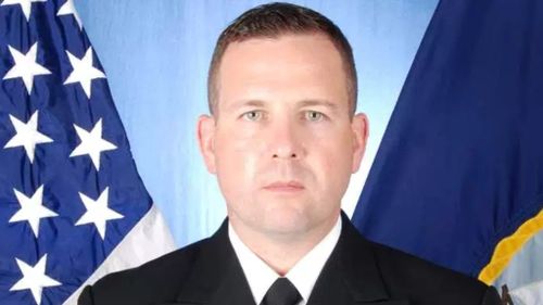 Commander Bryce Benson was evacuated from the USS Fitzgerald in a stable condition. (US Navy)