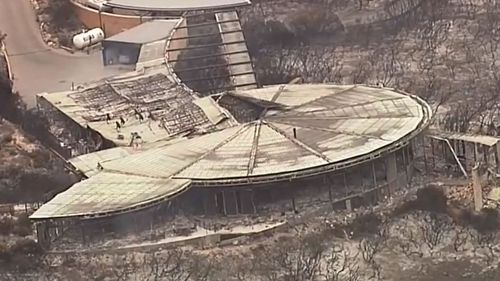 Harrowing images of the burned out lodge were captured by the 9News helicopter.