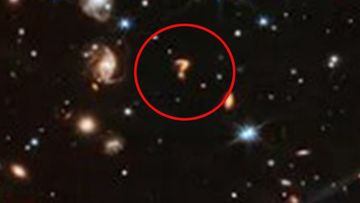 The James Webb space telescope spotted this odd, question mark-shaped feature in an image.