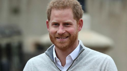 Prince Harry fronts the media as a proud dad.
