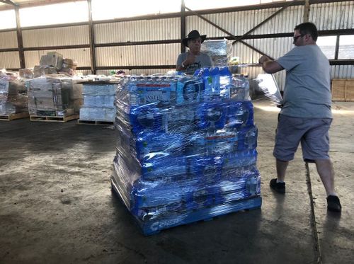 Lake Macquarie man Shane Worrall took one month of leave from work to organise the 'Fill A Truck for Farmers' campaign to help drought-stricken families.