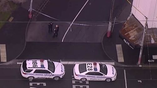 Police at the High Street property. (9NEWS)