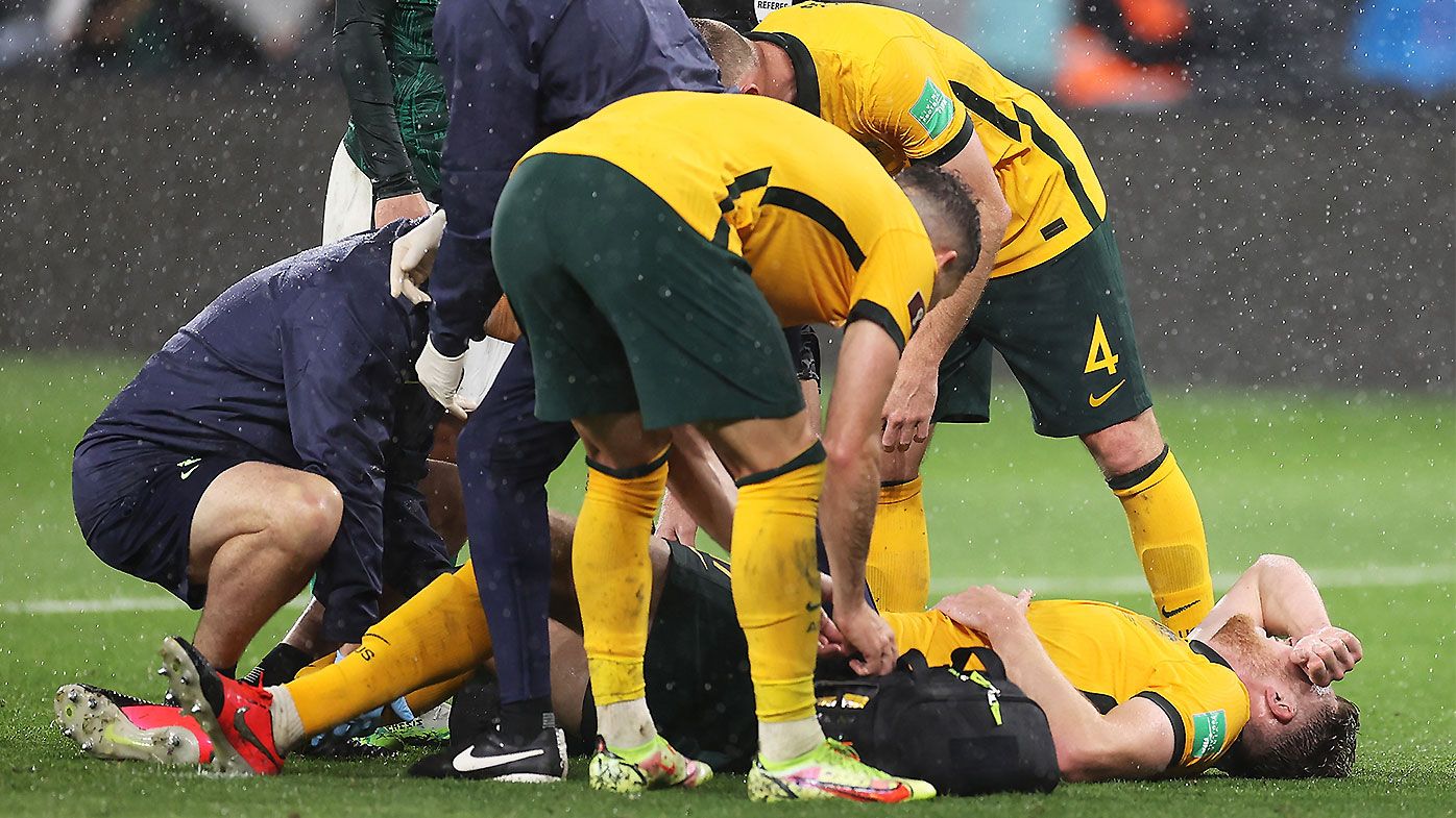 Socceroos' homecoming marred by 'serious' injury to rising star in drawn World Cup qualifier