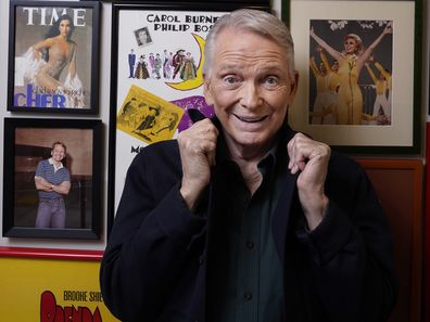 Costume and fashion designer Bob Mackie poses amongst memorabilia from his career, Oct. 20, 2021, at his home in Palm Springs, Calif.