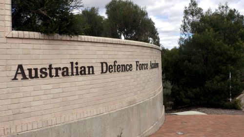Australian Defence Force Academy member arrested over alleged sexual assault of colleague