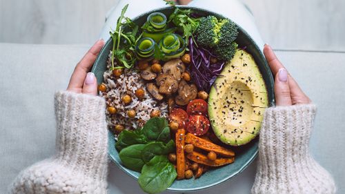 Healthy eating. Plate with vegan or vegetarian food. Healthy plant based diet. Healthy dinner. Buddha bowl with fresh vegetables. High quality photo