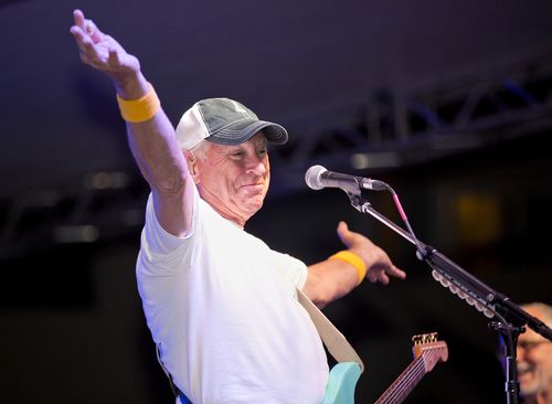 Singer/songwriter Jimmy Buffett finishes a song at the Parrot Heads Meeting of the Minds convention in Key West, Florida on Nov. 5, 2015