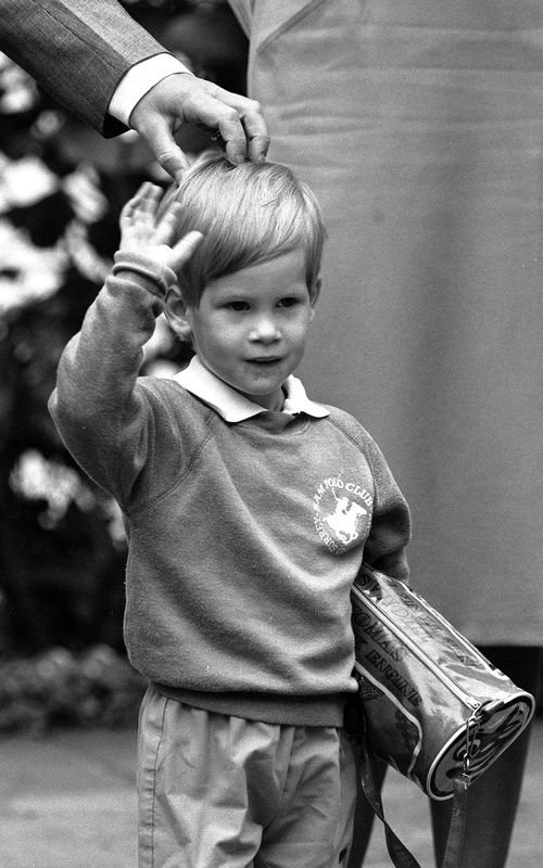 File photo dated from September 16, 1987, of Prince Harry arriving for his first day of nursery school at Chepstow Villas in west London with a Thomas the Tank Engine bag. (AAP)